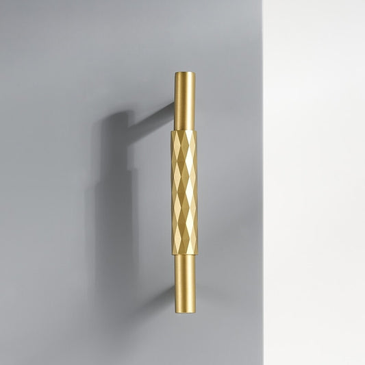 mat messing meubelgreep lang rond met facet element