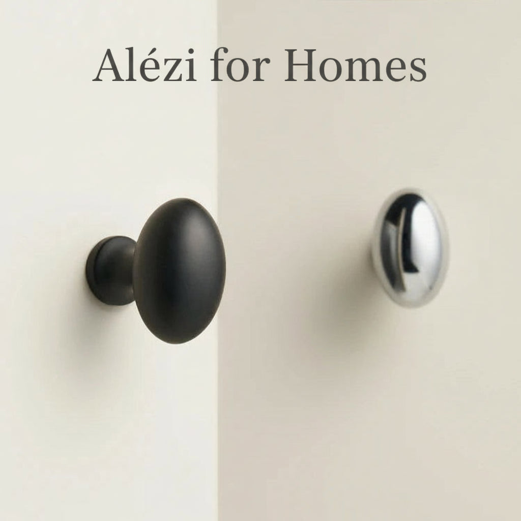 ei vormige meubelknop zwart op een witte ondergrond