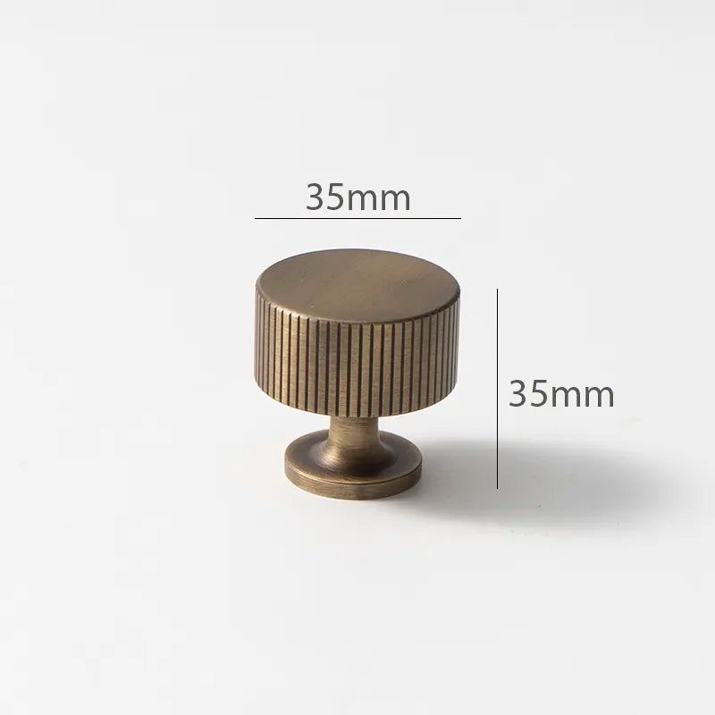 ronde meubelknop met ribbels aan de zijkant 35mm uitgevoerd in geborsteld brons